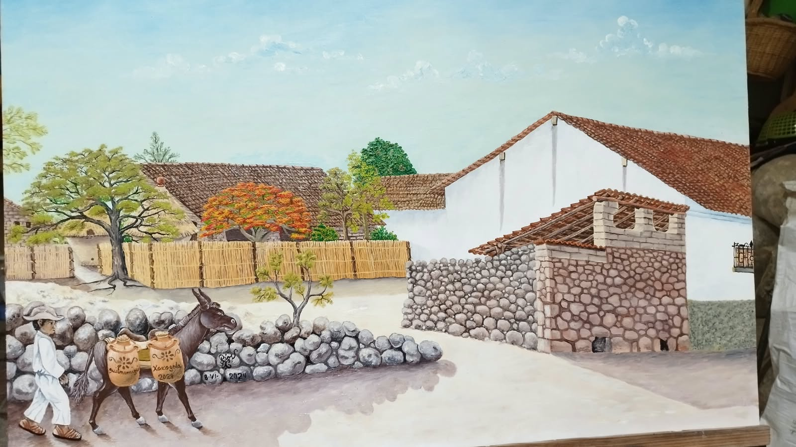 Pintura de una calle con casas y una persona junto a un burro